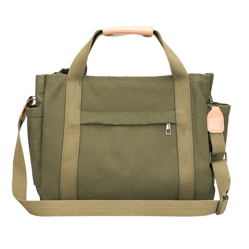 Large horizontal square canvas tote bag in army green with visible sewing lines and open zipper sides.