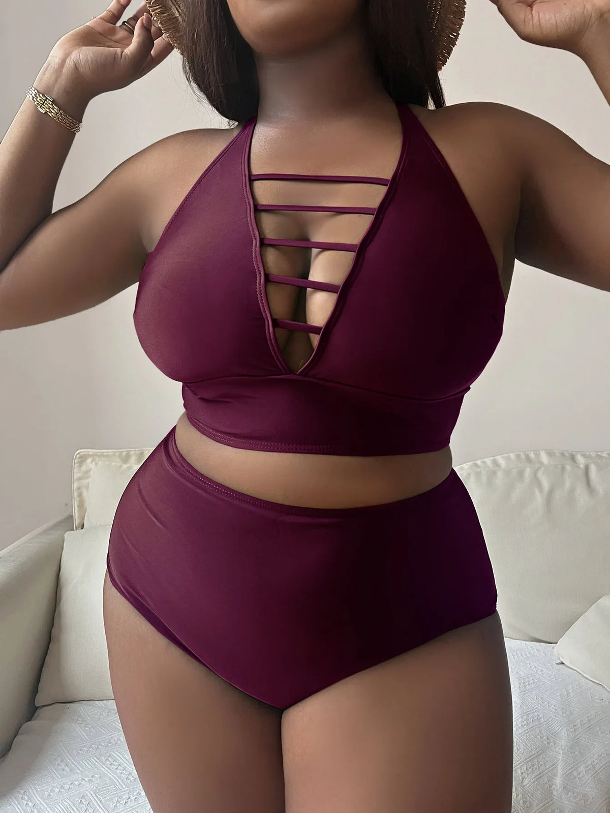 Plus size halter bikini set with adjustable cross straps and high-waist briefs in solid colour