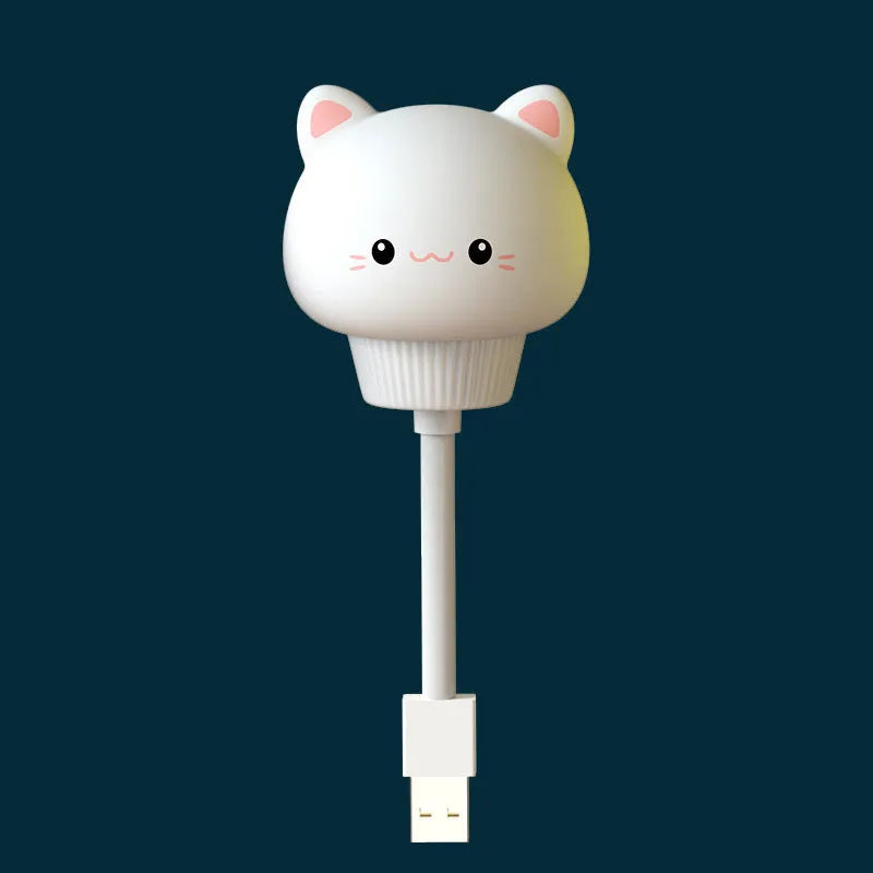 Cartoon bear-shaped USB night light with remote control on bedside table