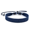 Denim fabric bracelet carrying strap with mixed materials and unisex design