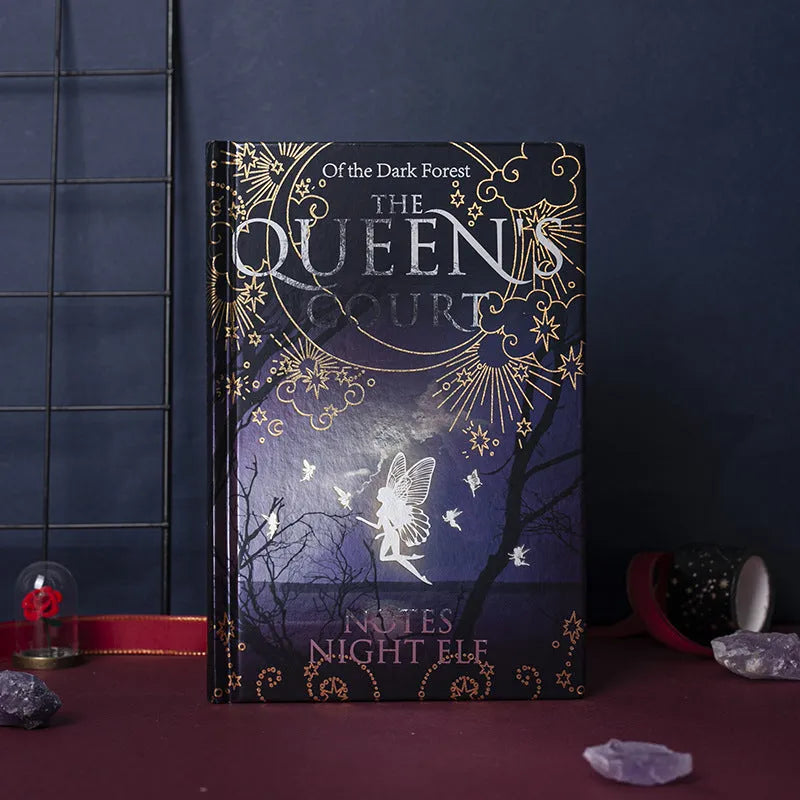 Blue and purple A5 luminous hardcover notebooks open to show full-colour illustrated pages.