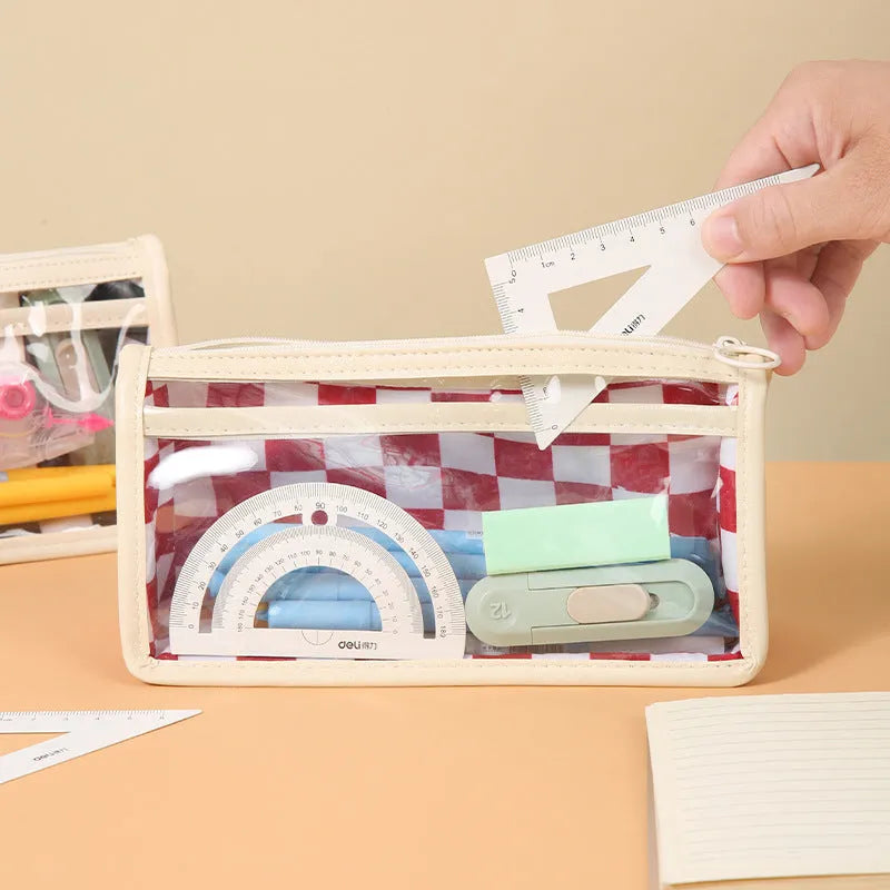 Transparent PVC pencil case with chessboard pattern showing pens inside, dimensions 21.5x8x11.5cm