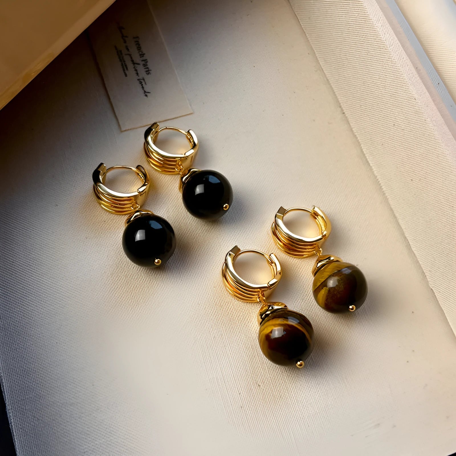 Gold-plated geometric earrings with tigereye stone beads in French retro style