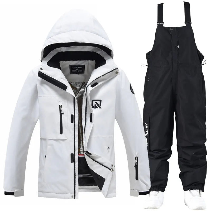 Blue and black unisex winter ski suit jacket and pants for snow sports.