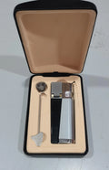 Silver and black foldable metal pipe lighter showing open and closed positions with refillable butane valve
