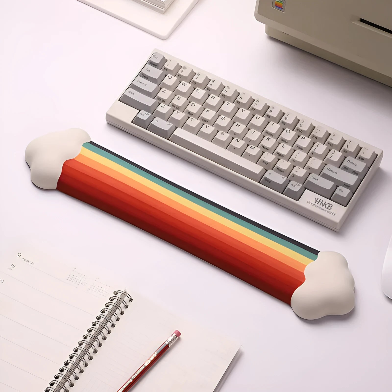 Silicone wrist rest mouse pad and matching keyboard support with cloud pattern design on desk