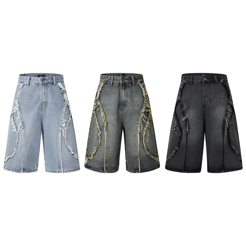 Distressed raw edge denim shorts in straight leg cropped fit.