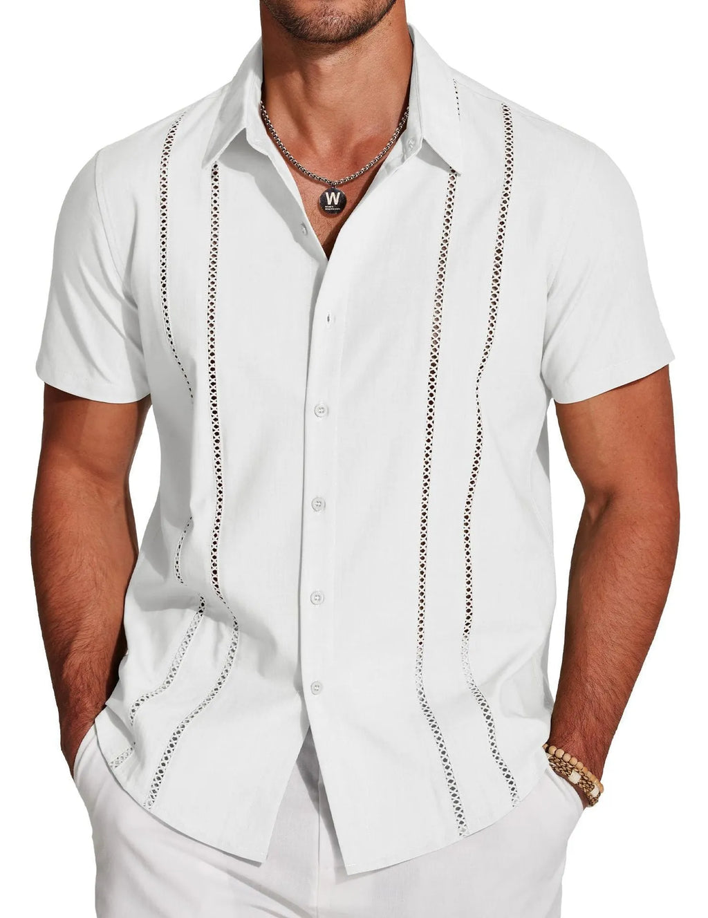 Man wearing a slim fit, short sleeve Hawaiian shirt with a vibrant digital print pattern