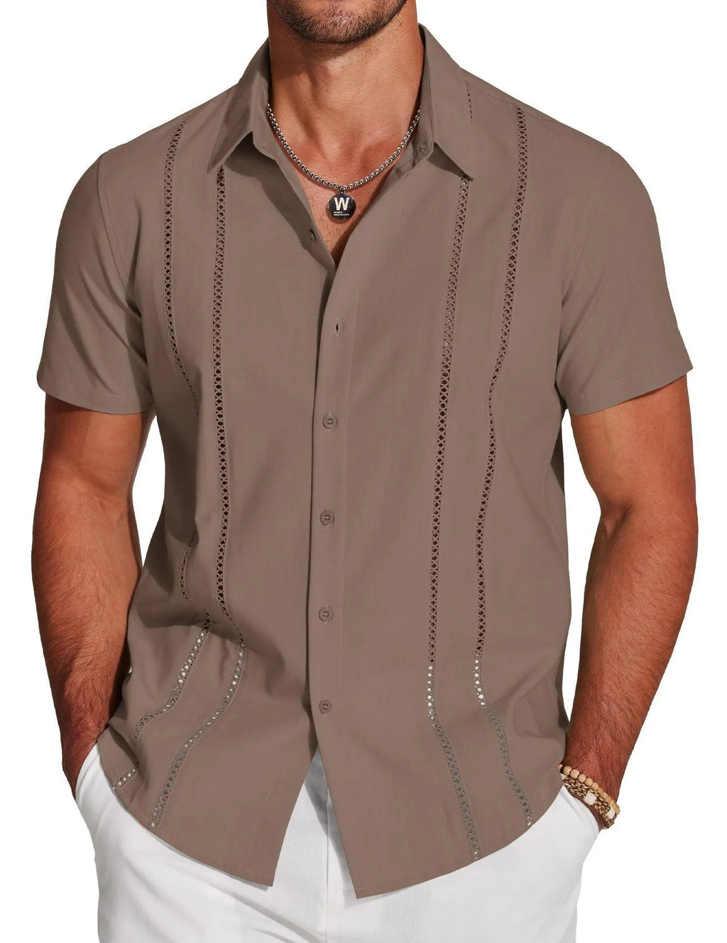 Man wearing a slim fit, short sleeve Hawaiian shirt with a vibrant digital print pattern