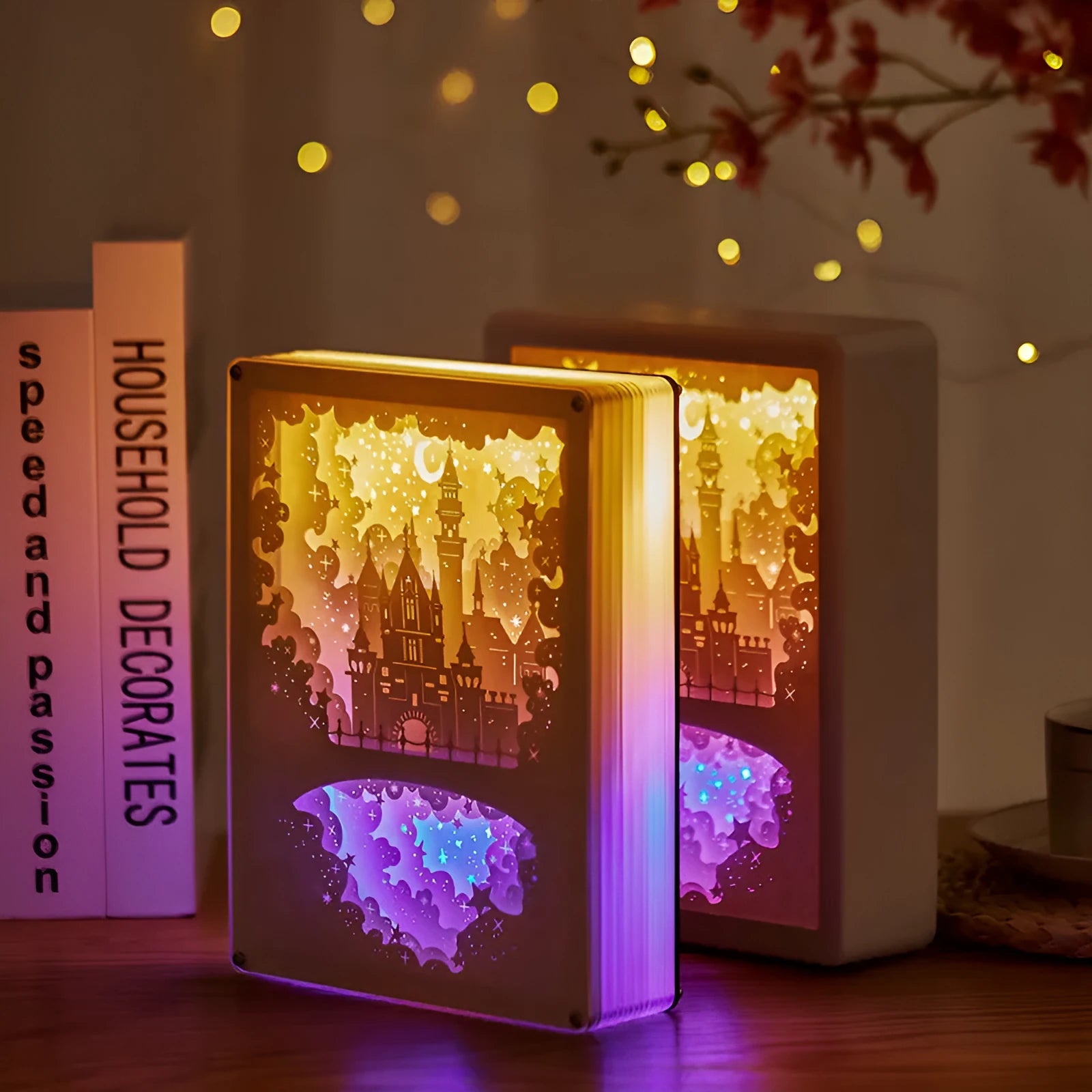Modern 3D carved USB night light with remote control on a bedside table.