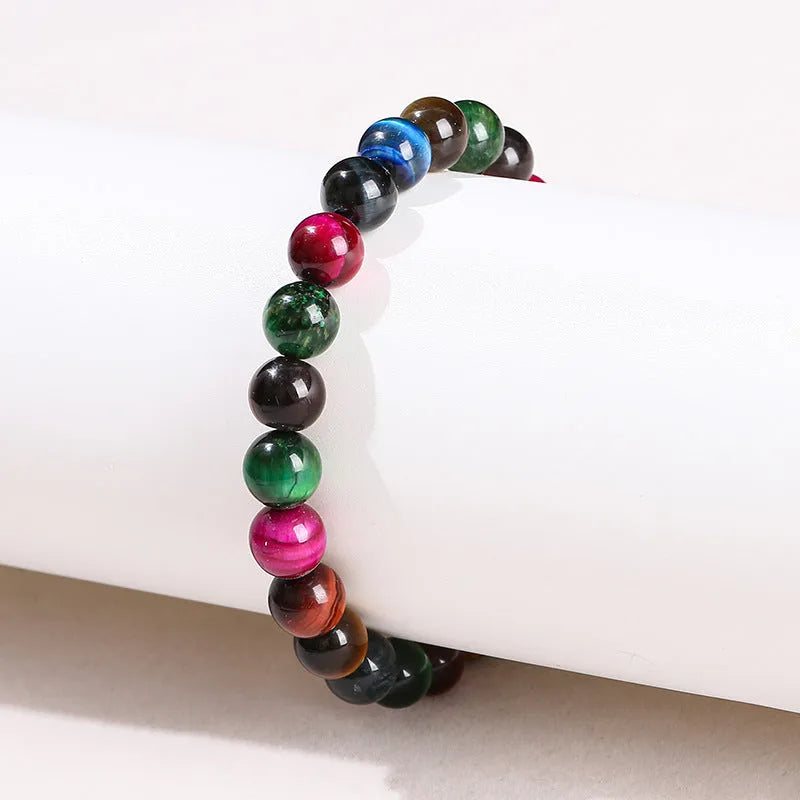 Colourful tiger-eye gemstone bead bracelet in round beads on a string.