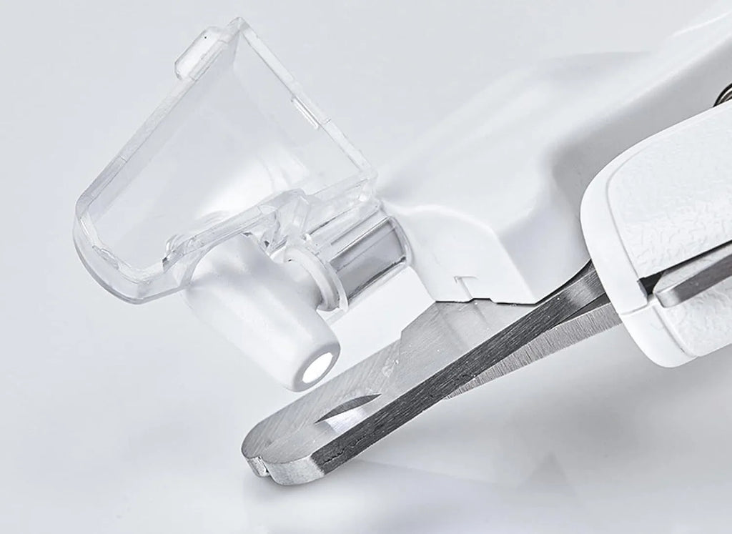 White pet nail clippers with LED light, anti-splash guard, and leather-like handle.
