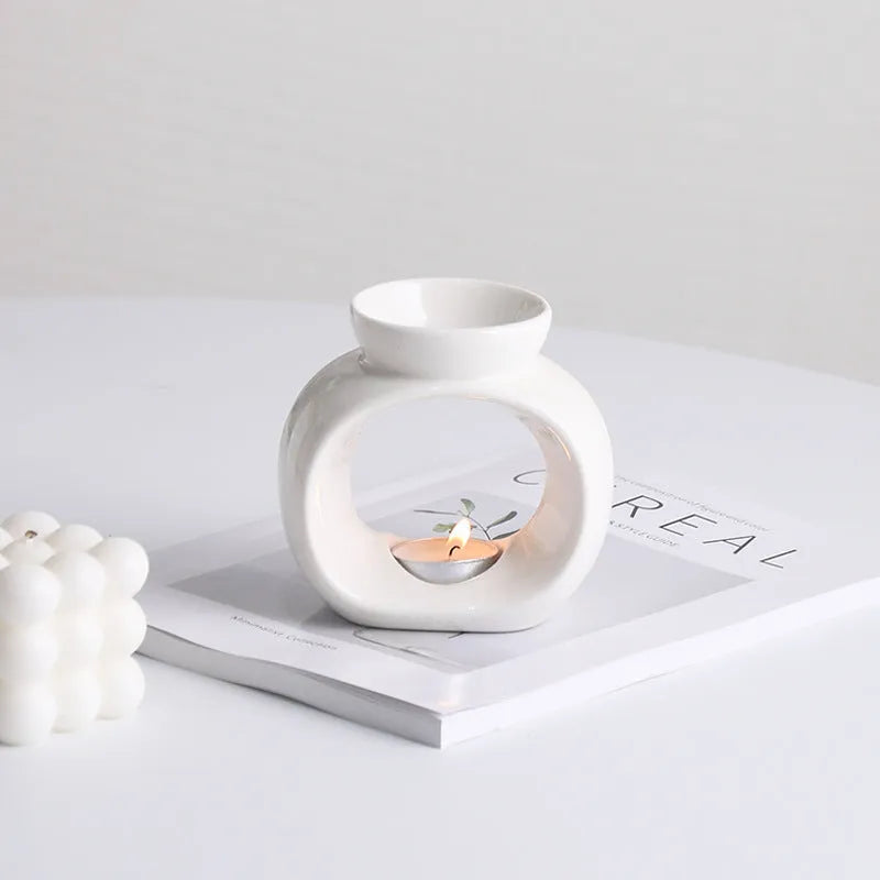 White ceramic Nordic style aromatherapy stove ornament with anti-dry burning design
