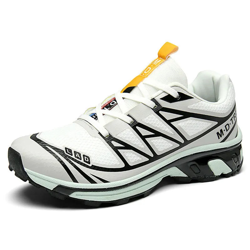 Men's and women's low-top hiking shoes in khaki colour with round toe and lace-up front.