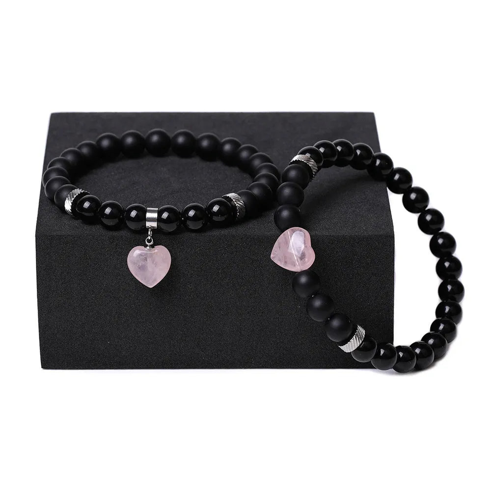 Polished natural stone couple heart bracelets in obsidian, agate, tigereye, crystal, aventurine, topaz, opal colours.