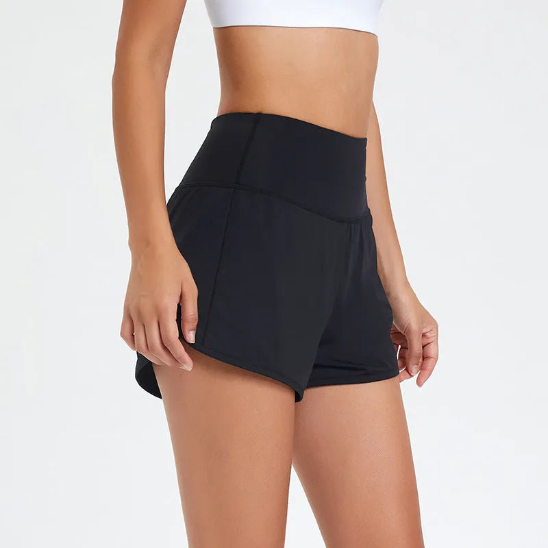 Women's black quick-drying nylon high-waist fitness shorts on a white background.