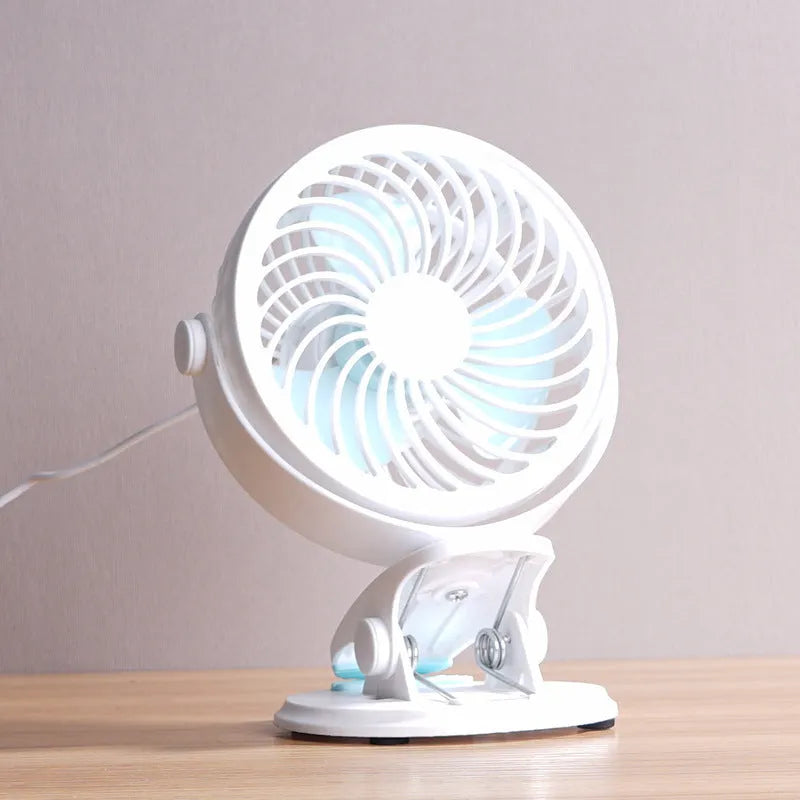 Mini USB desk fan in clip and floor standing styles on a wooden desk