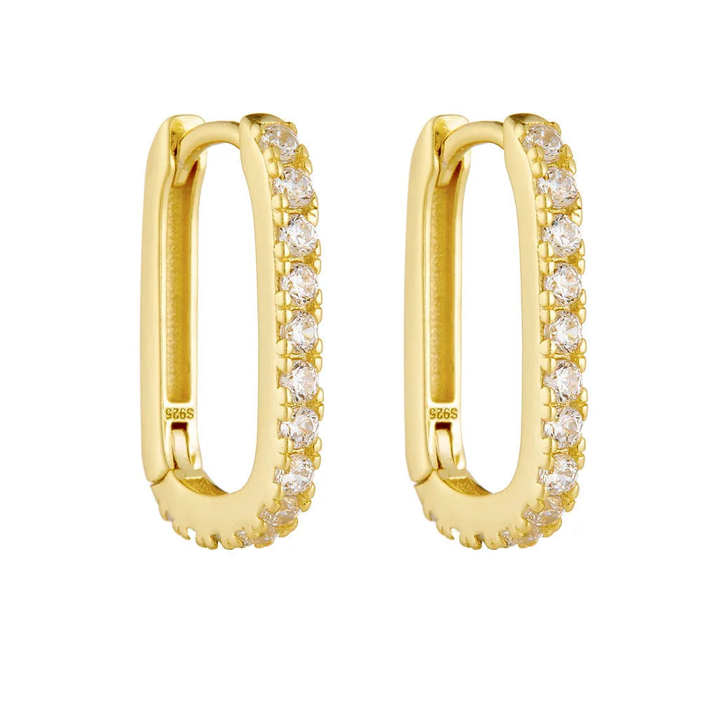 Sterling silver oval zircon ear clips with geometric design in yellow or white silver finishes