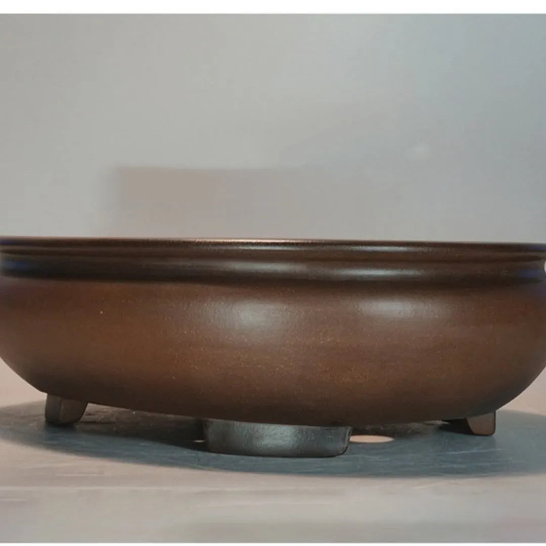 Handmade purple clay classical style flowerpot for indoor desktop use.
