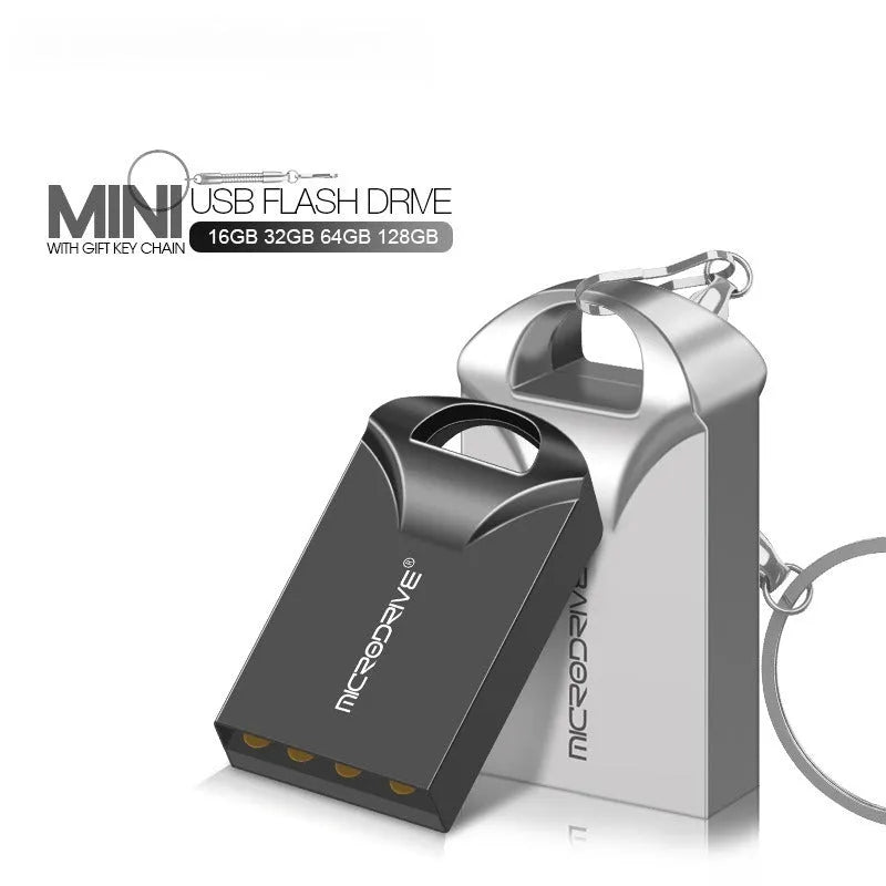 Small black and silver metal USB flash drive showing size comparison