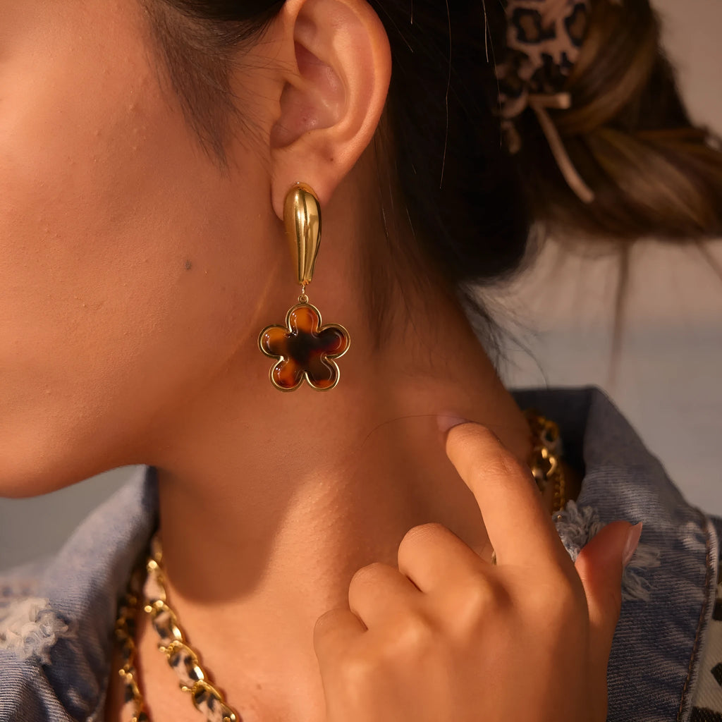 Women's tortoiseshell colour earrings with 18K gold plating, showing heart-shaped and floral geometric designs on a stainless steel base.