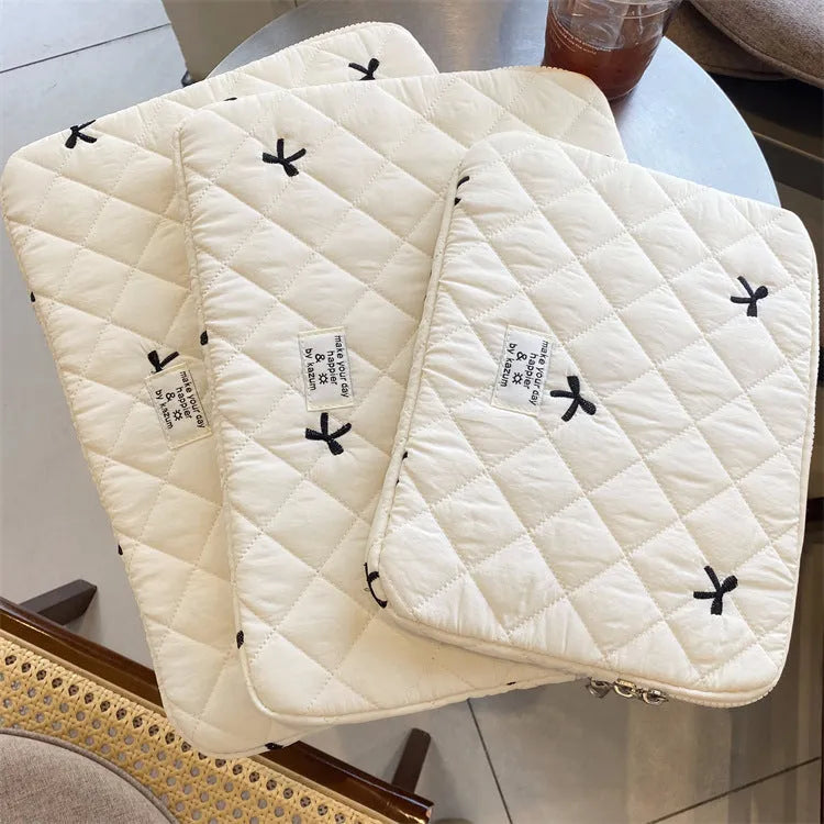 Rhombus embroidered bow laptop storage bag in nylon material with size options for 11-inch to 15.6-inch devices