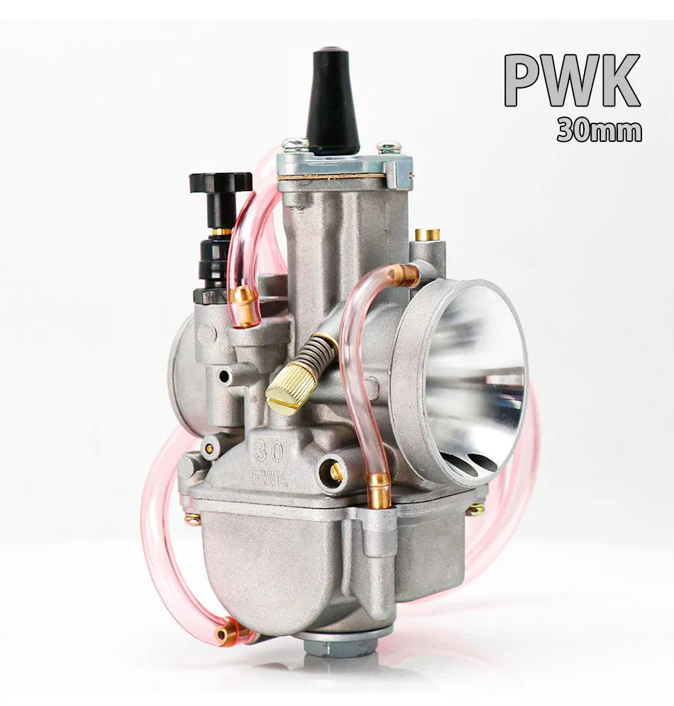 Seven PWK sandblasted motorcycle carburetors ranging from 21mm to 34mm sizes in colour box packaging