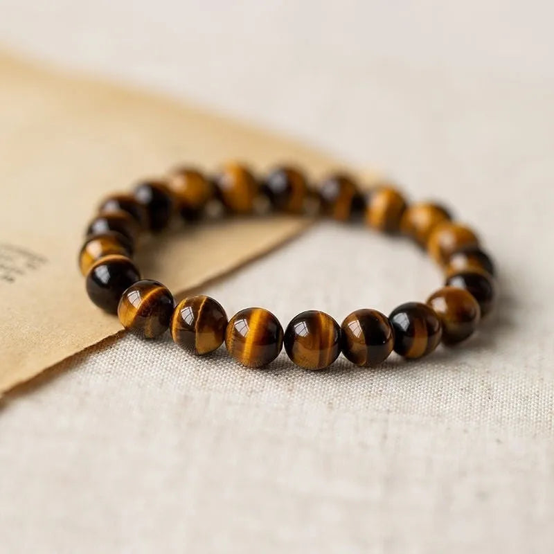 Ethnic style single circle beaded Buddha rosary bracelet shown in different bead sizes on a wrist.