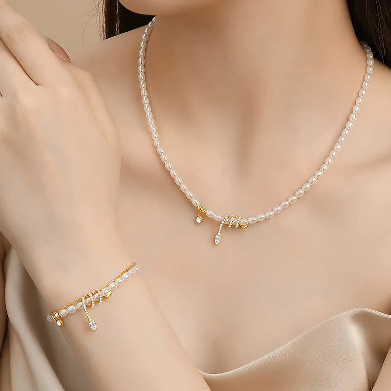 Pearl snake classic style bracelet in 925 silver with gold or white gold plating, featuring zodiac snake and geometric design