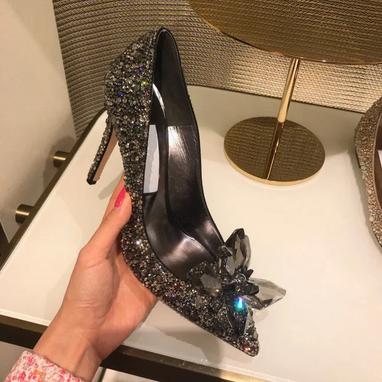 Women's gold high heels with pointed toe, stiletto heel and rhinestone sequin decoration