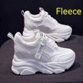 Women's black mesh platform casual shoes with hollow out details and a toe holder.