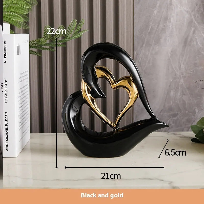 Modern white porcelain love heart ornament with a choice of metallic gold, silver and coloured finishes.