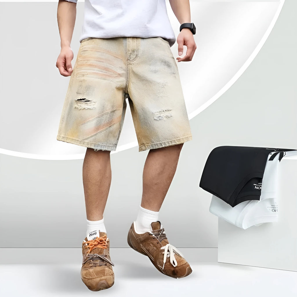 Men's light blue ripped denim shorts with straight leg style and mid-waist fit