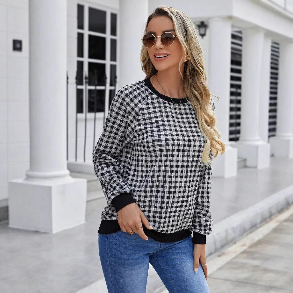 Black long sleeve polyester sweater with striped plaid print pattern