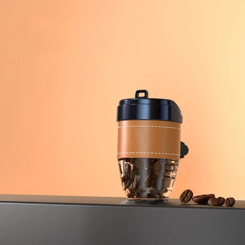 Cup-shaped car air freshener with coffee beans fragrance in plastic housing