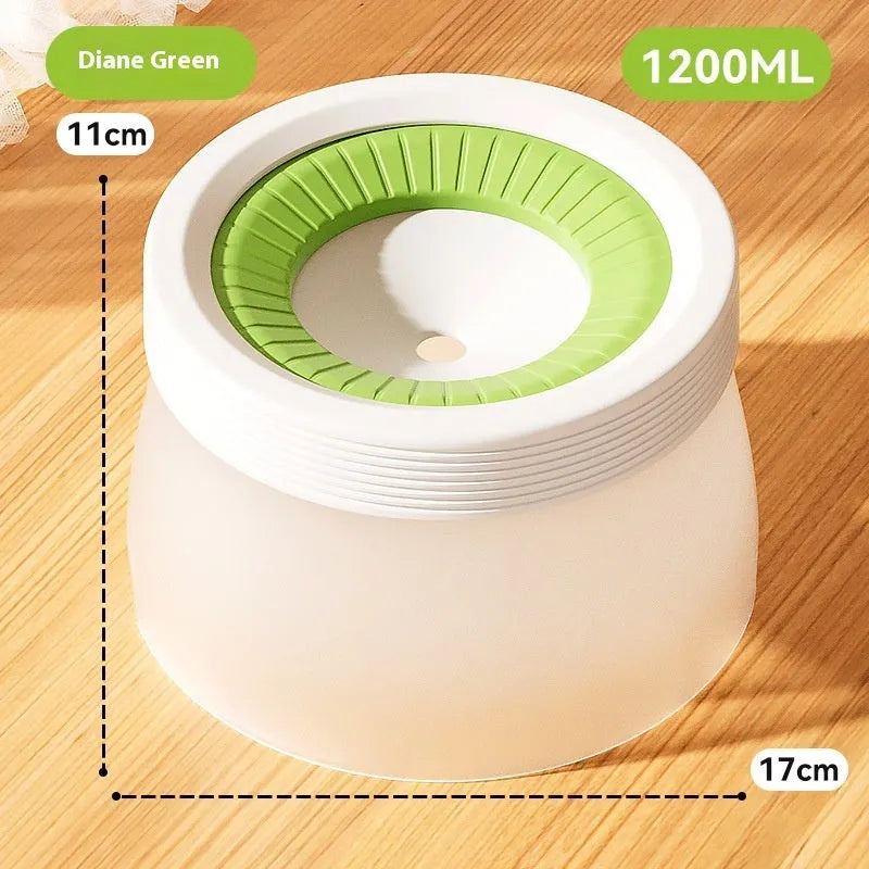 Green, blue, and brown pet suspension drinking bowl with separate base plate on a white background.