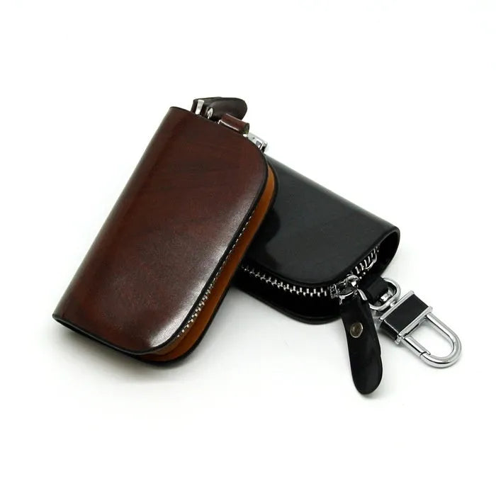 Genuine leather car key case in frosted black or brown with zipper closure