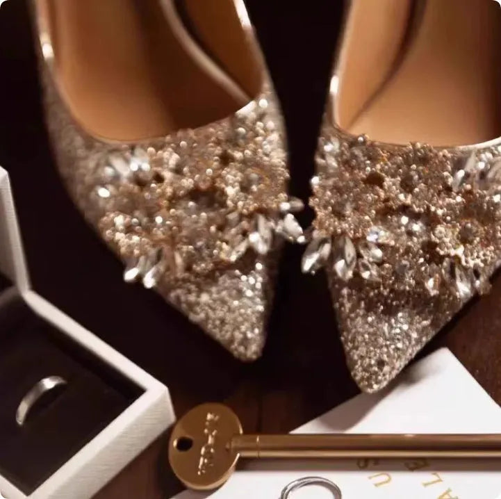 Champagne coloured wedding shoes with crystal flower pattern and pointed toe