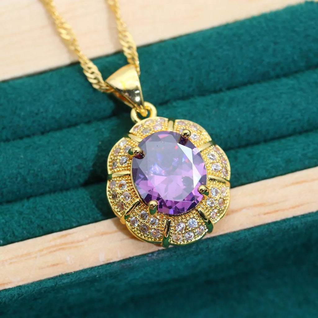 Gold plated jewellery set with multi-colour cubic zirconia stones including necklace, earrings, ring and bracelet