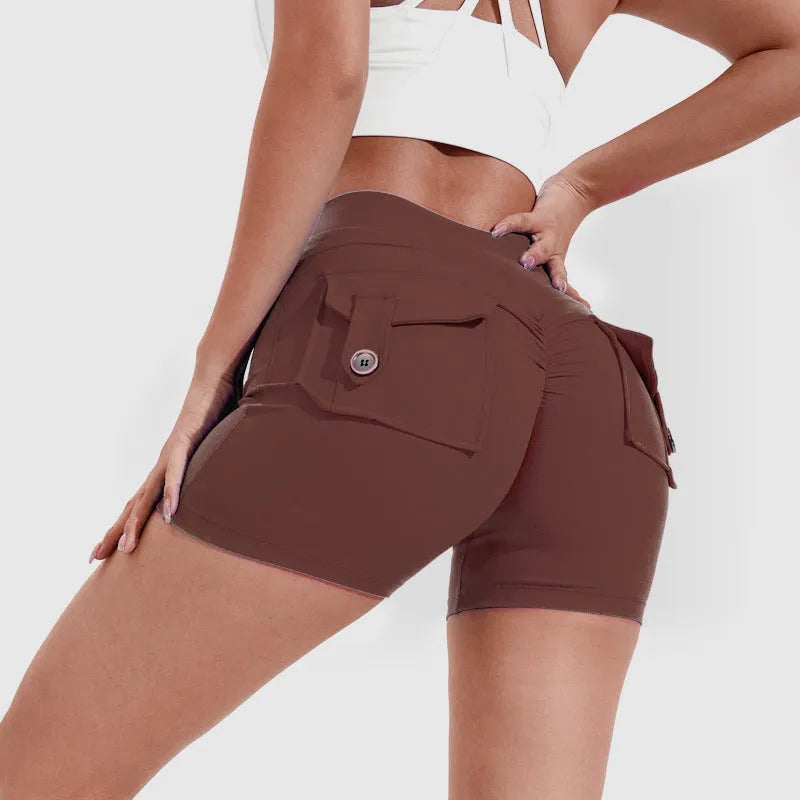 Women's high waist hip lifting shorts with pockets in various colours for fitness activities