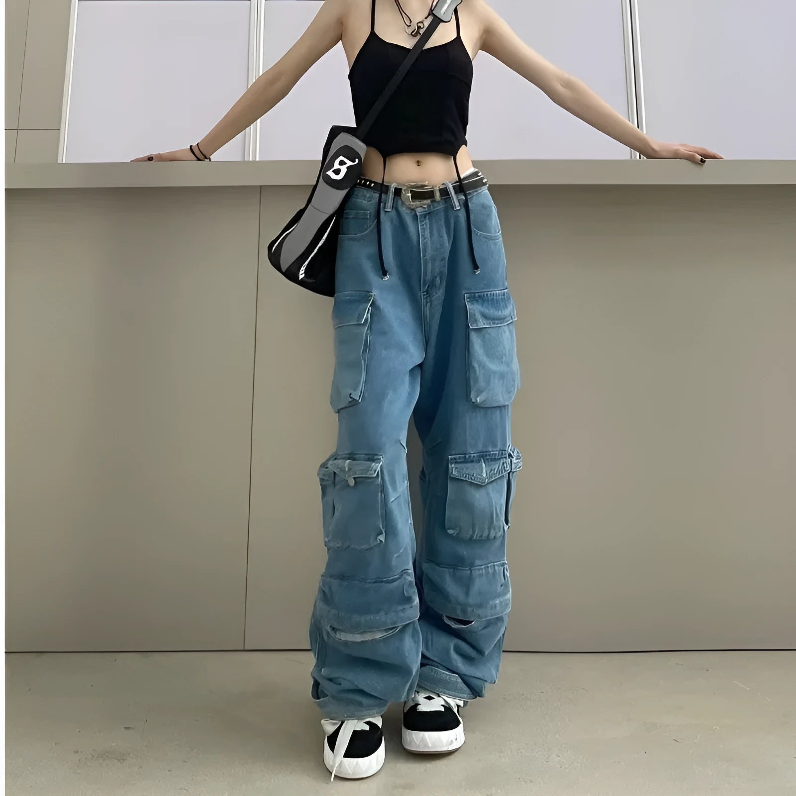 Women's tie-dyed high waist jeans with multiple pockets and wide leg silhouette