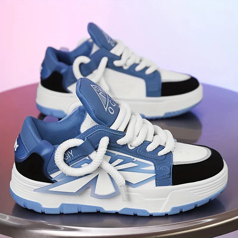 Men's black chunky sneakers with a cartoon totem pattern on the synthetic leather upper.