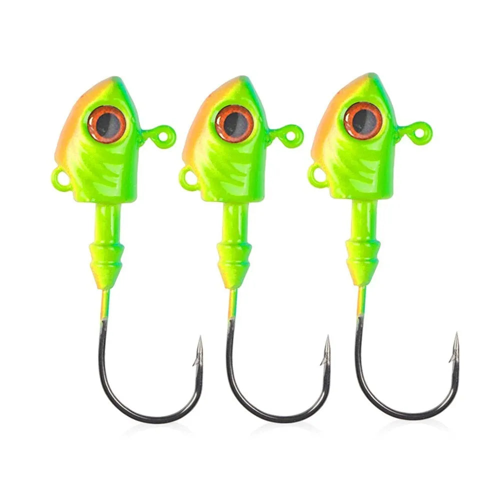 Three yayu shaped lead fishing jig hooks in different weights and colours on a blue background.