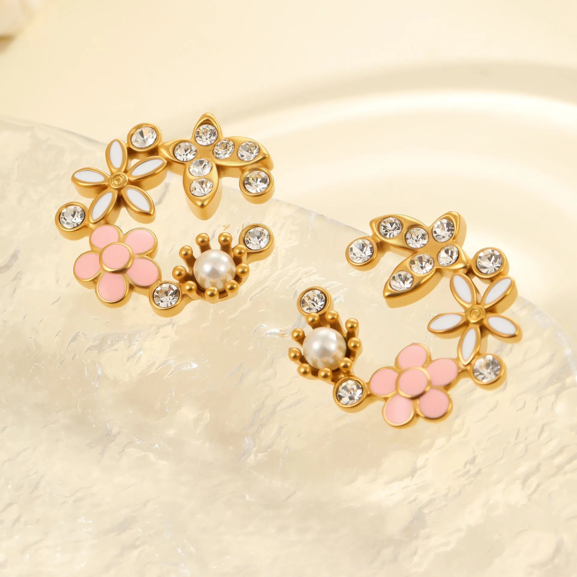 Gold electroplated flower stud earrings with petal design and colourful oil finish