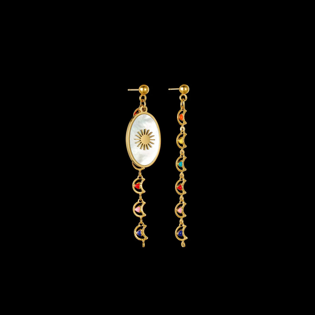 Geometric stainless steel drop earrings showing eight awn star, eye, and shell sun designs