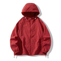 Loose fit nylon blend sports jacket for men and women shown in a choice of nine colours including black, navy, and wine red.