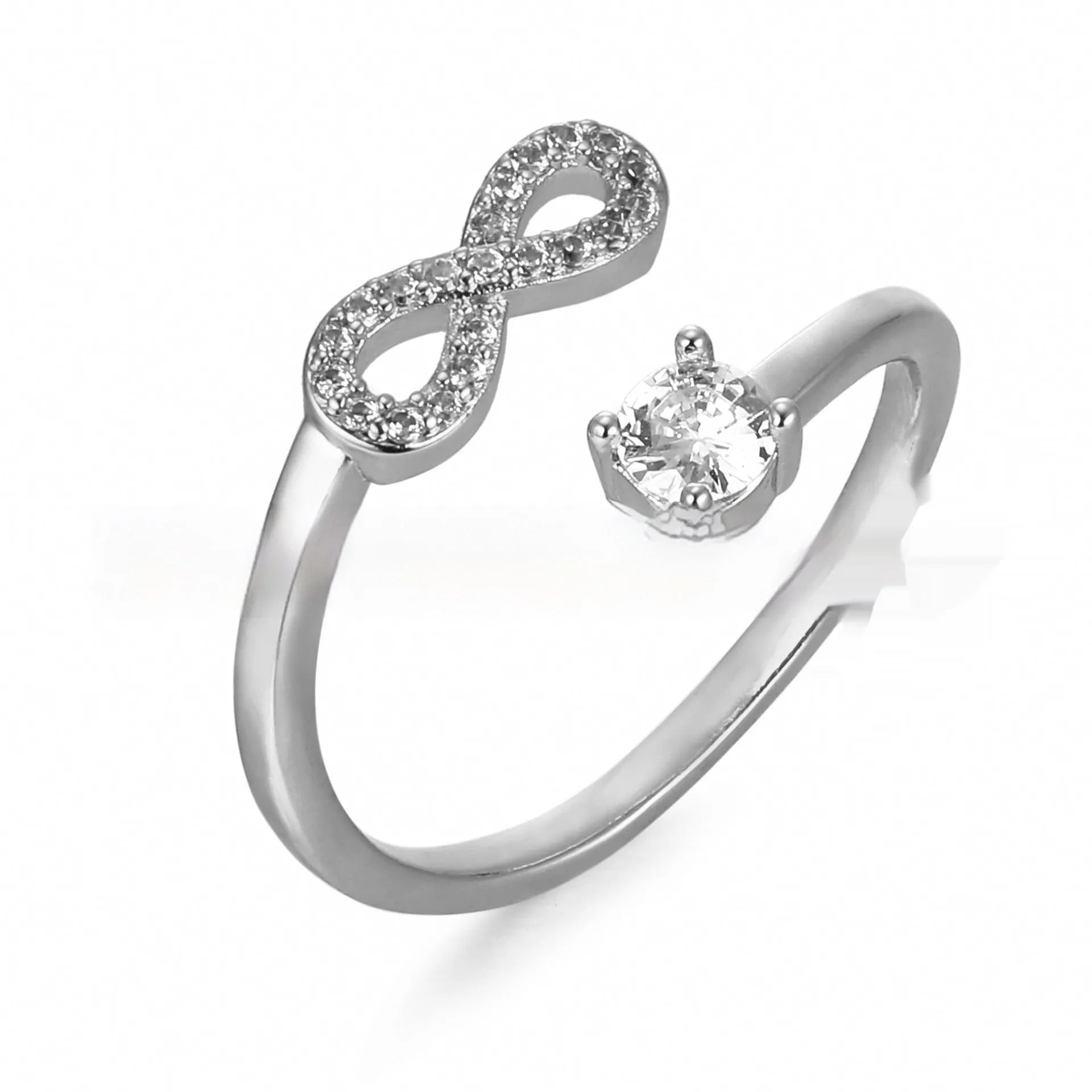 Open geometric metal ring with a centred zircon stone, displaying a personalised initial, in gold finish.