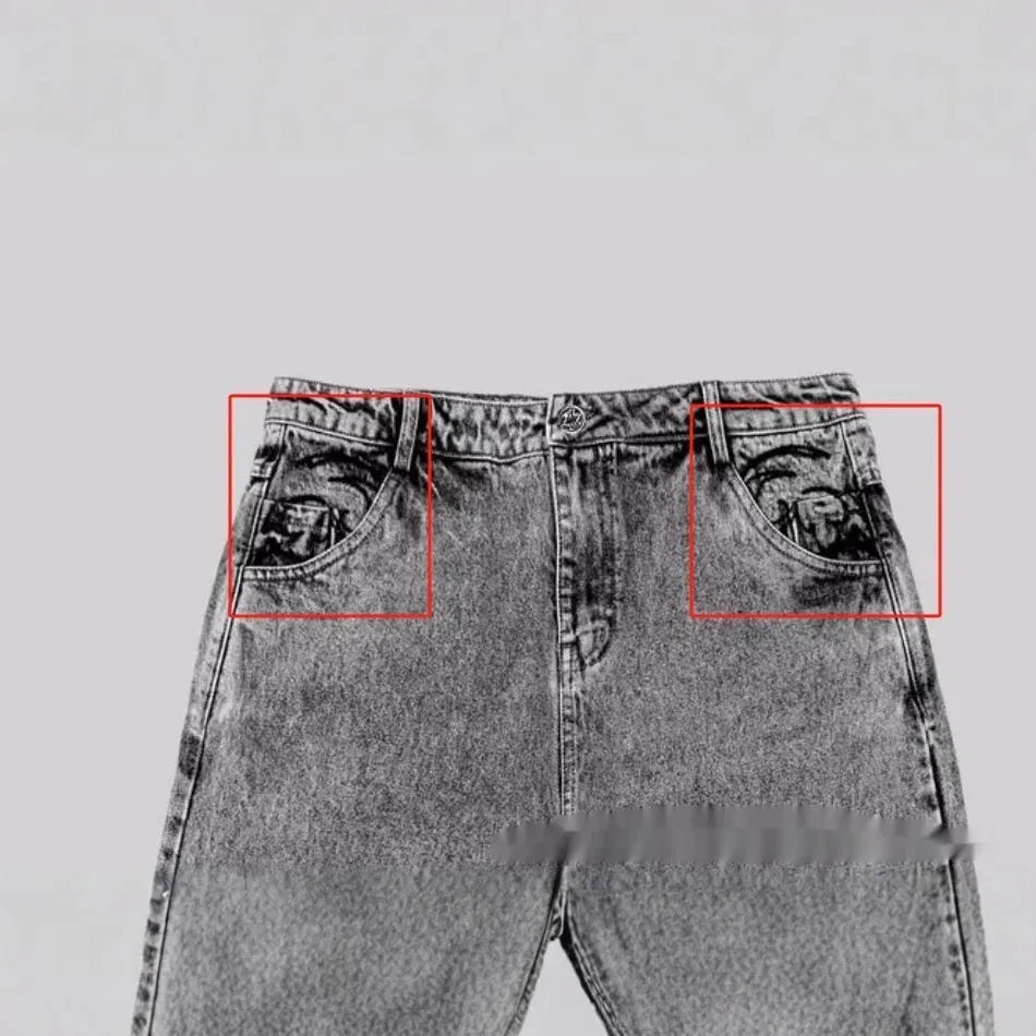 Grey loose straight-leg cotton denim trousers for men and women on a hanger