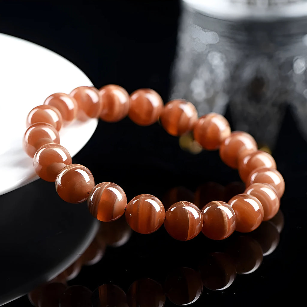 Peruvian Old Mine Rhodochrosite bracelet with geometric design and round beads