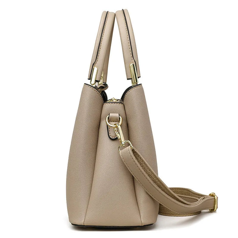 Women's black PU leather shoulder messenger bag with multi-layer compartments and sewing thread detailing